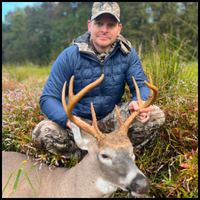 Hunter with prize buck