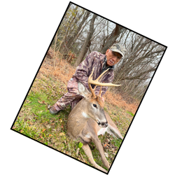 Hunter with prize buck