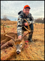 Hunter with prize buck