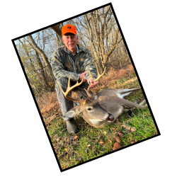 Hunter with prize buck