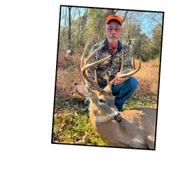 Hunter with prize buck