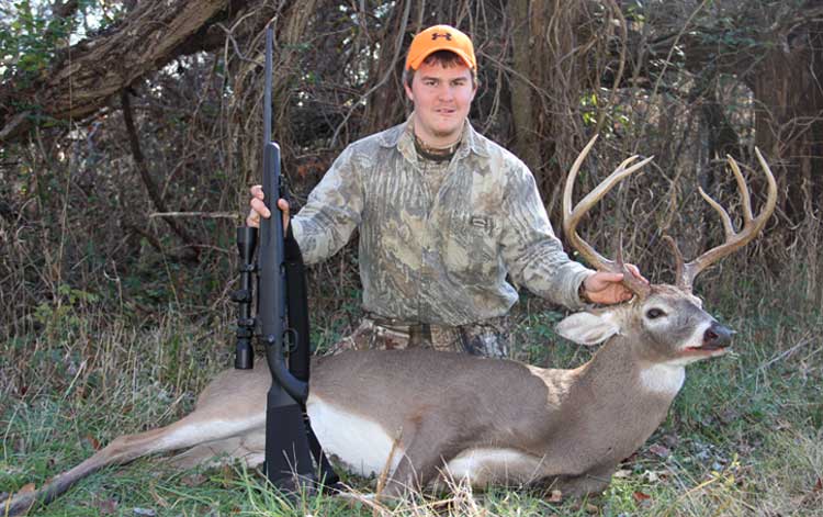 Hunter with deer